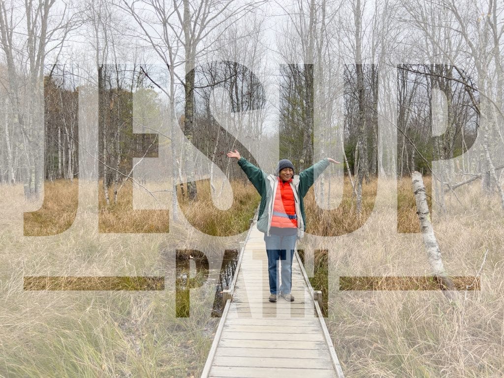 Photo of a postcard example of a person on the Jesup Path in Acadia National Park. It reads "Jesup Path."